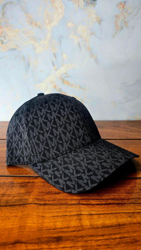 Gorra M K.