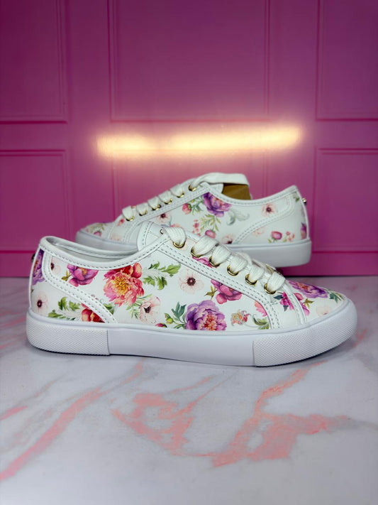 Tenis para dama.